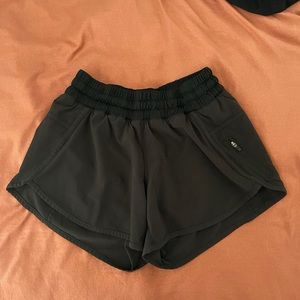 LULU TRACKER SHORTS SIZE 4